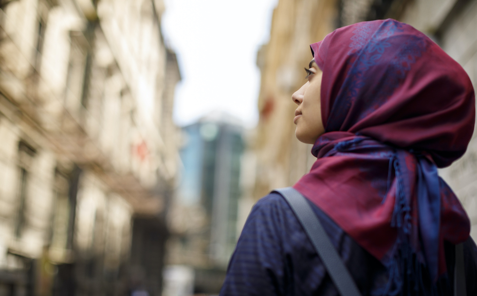 Muslim tourist exploring city